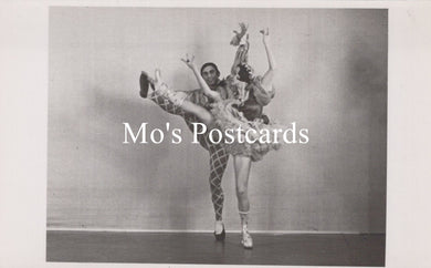 Black and white photo of two dancers in a pose with 'Mo's Postcards' text overlay.