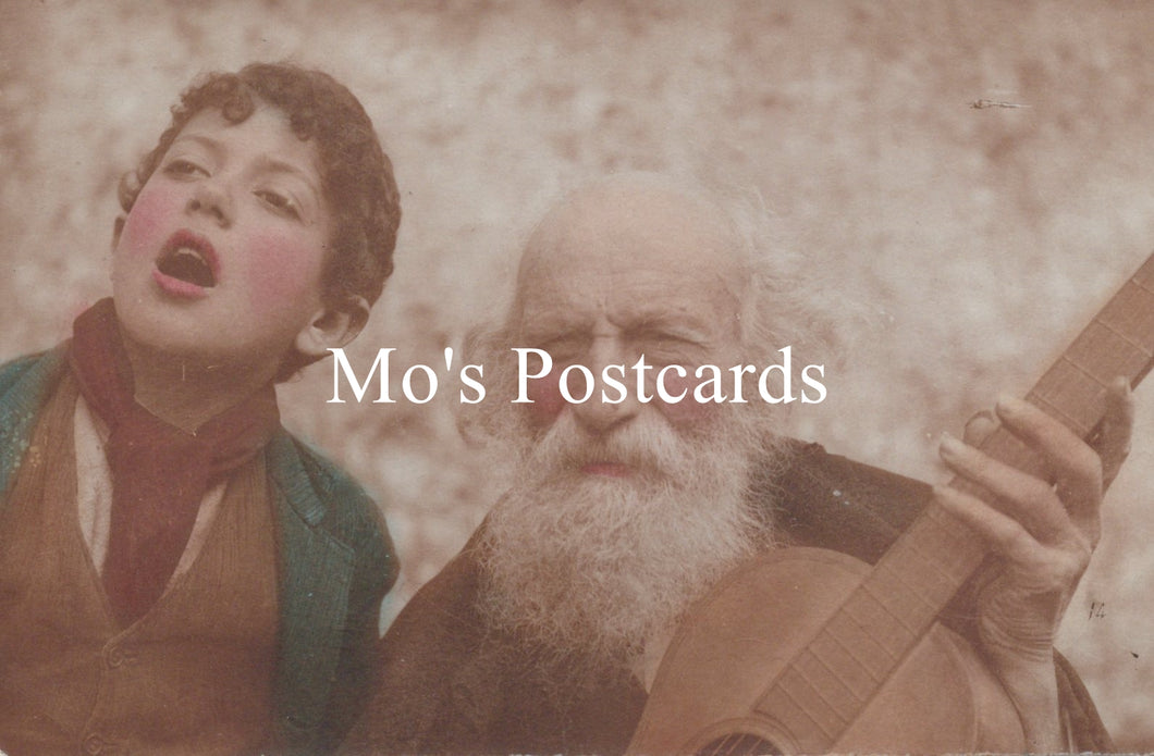 Two people, one singing and the other playing a guitar, with 'Mo's Postcards' text overlay.