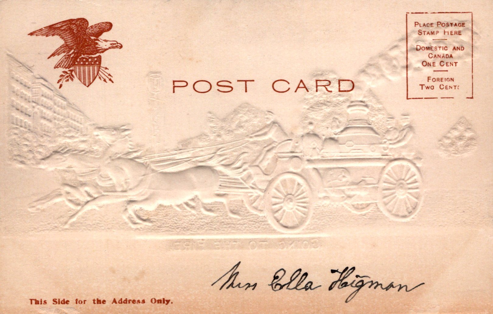 Vintage postcard with embossed design of an eagle and a carriage, featuring the text 'POST CARD'.