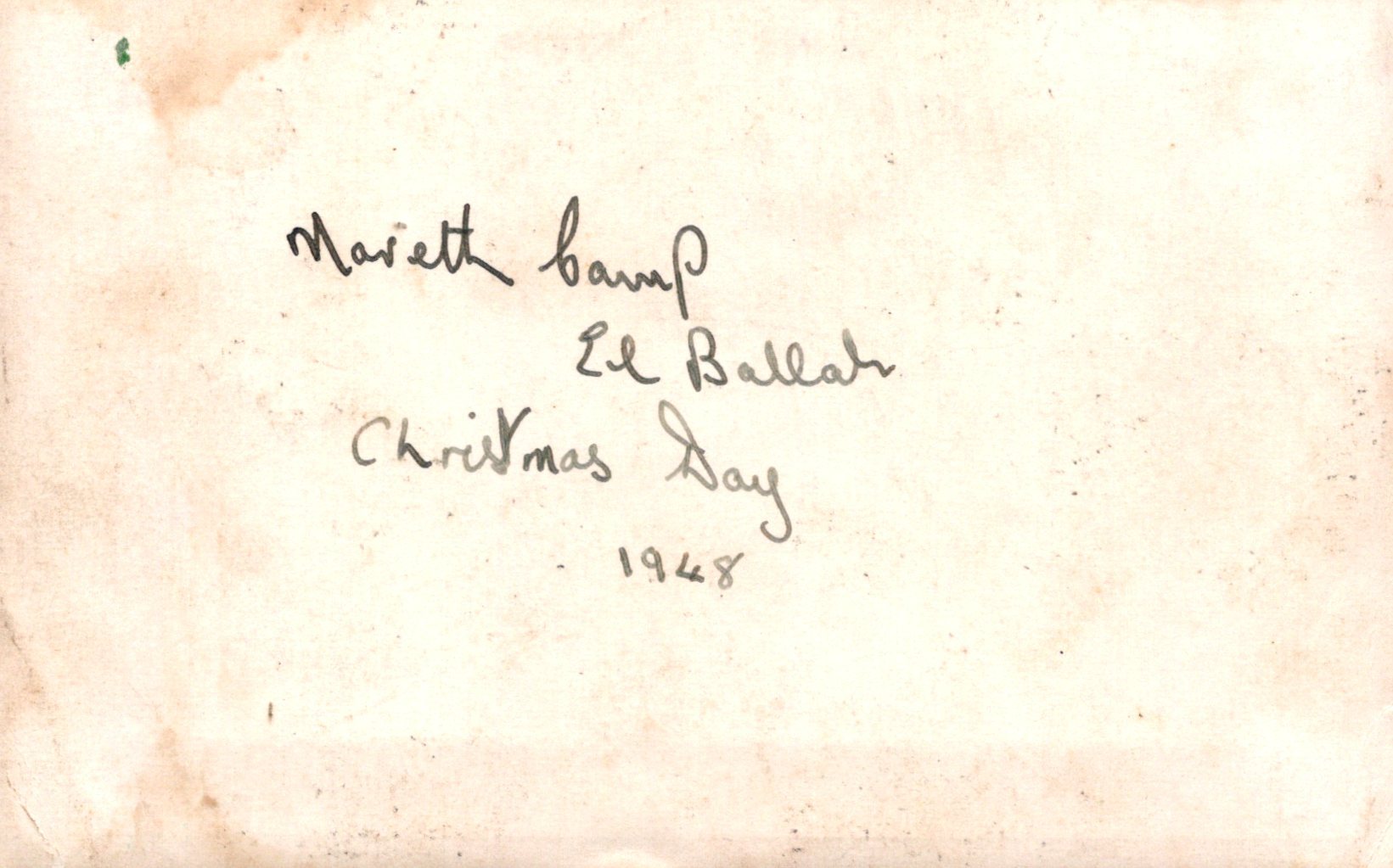 Handwritten text on a light brown background