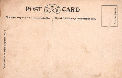 Back of a vintage postcard with typographic design and text.
