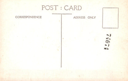 Vintage postcard with 'Correspondence Address Only' text and a stamp on a beige background