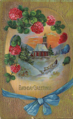 Vintage-style birthday card with a scenic illustration of a house and mountains, surrounded by red flowers and green leaves, tied with a blue ribbon.