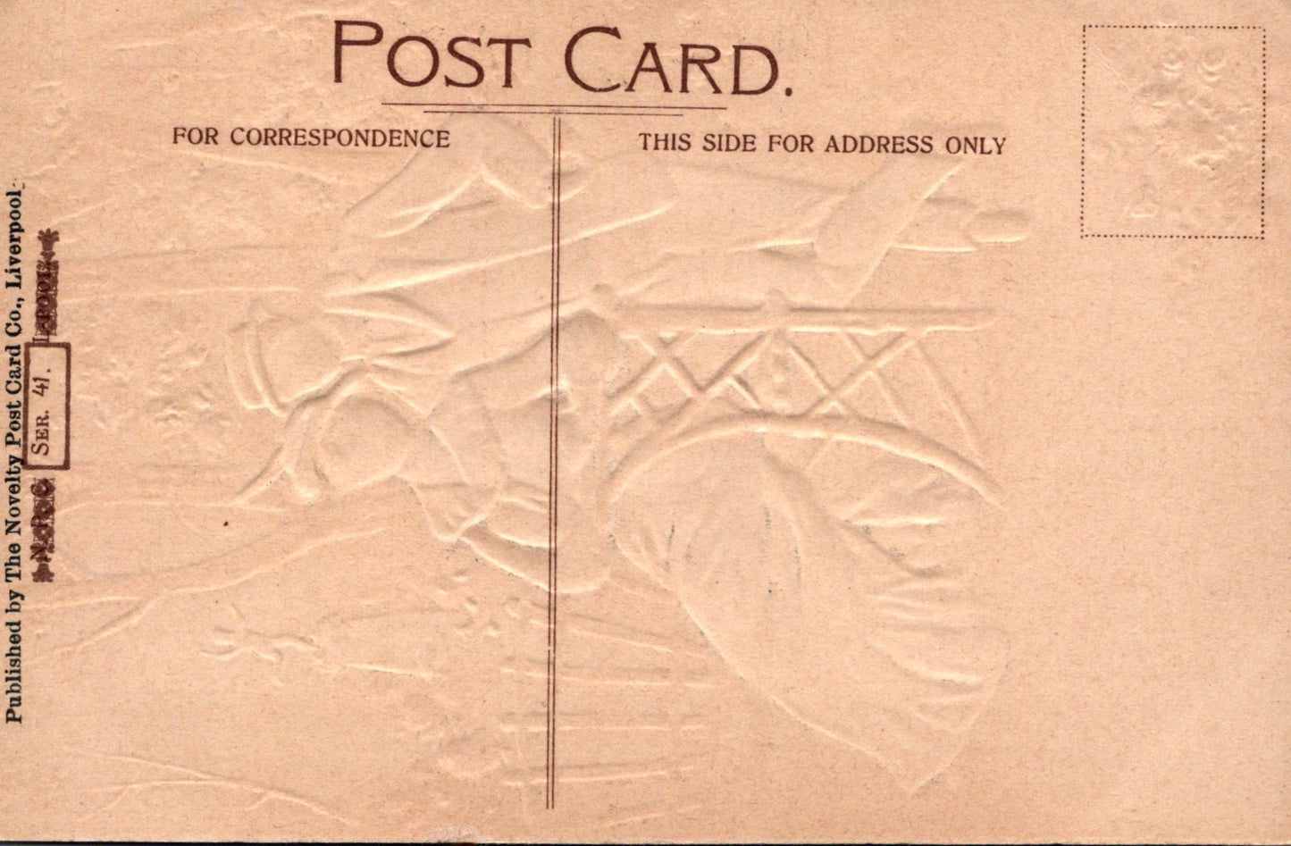 Back of a vintage postcard with embossed design and text.