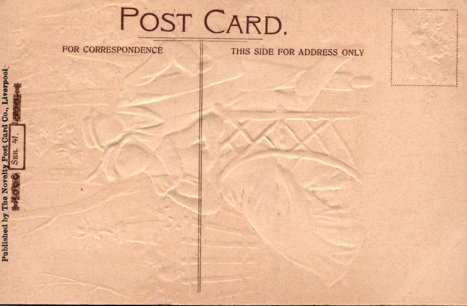 Back of a vintage postcard with embossed design and text.