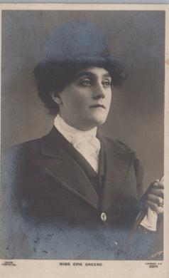 Vintage photograph of a woman wearing a hat and formal attire