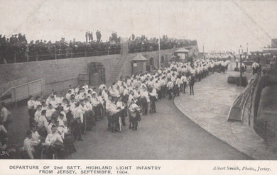 Vintage photograph of a military departure scene with people on a ship, likely from Jersey in 1904.