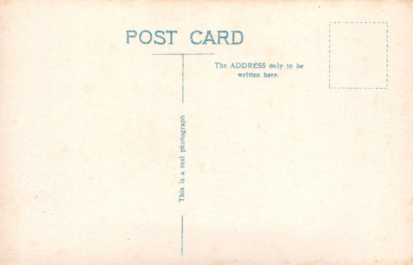 Back of a postcard with text and address field
