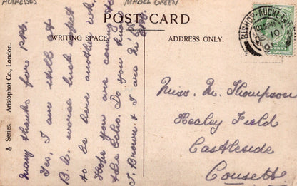 Vintage postcard with handwritten text and a stamp, featuring Aristoport Co. branding.