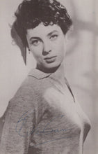 Load image into Gallery viewer, Black and white portrait of a woman wearing a sweater with a signature at the bottom.
