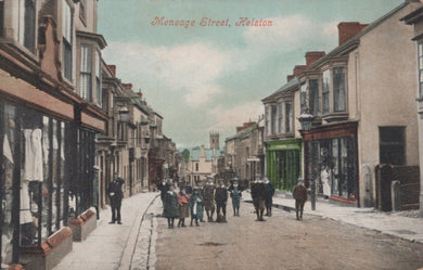 Vintage street scene in Helston with people and shops on Menage Street