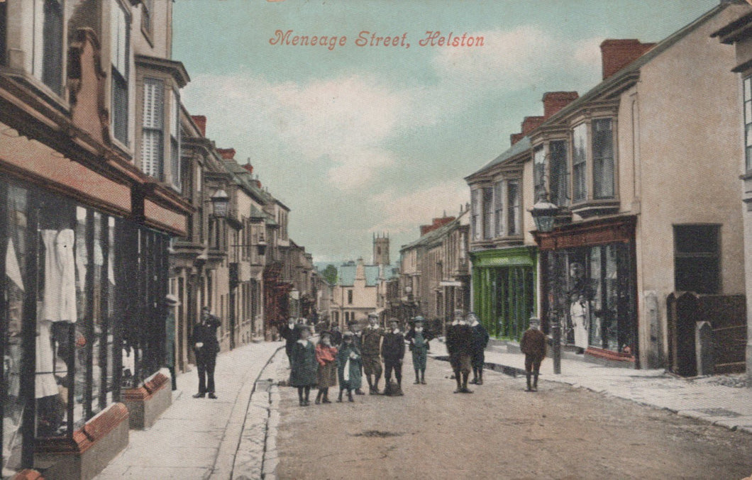 Vintage street scene in Helston with people and shops on Menage Street
