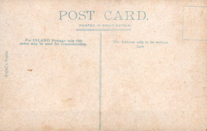 Vintage postcard with text and a grid pattern on a beige background