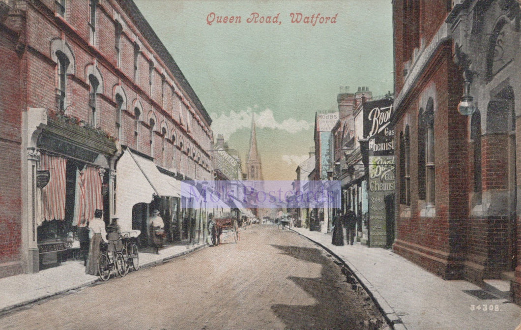 Vintage street scene of Queen Road, Watford with horse-drawn carriages and pedestrians.