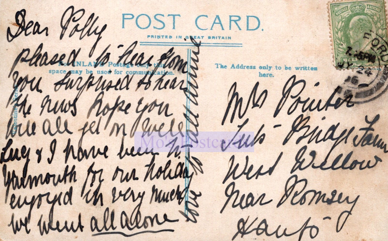 Vintage postcard with handwritten text and a stamp, featuring the word 'Postcard'.