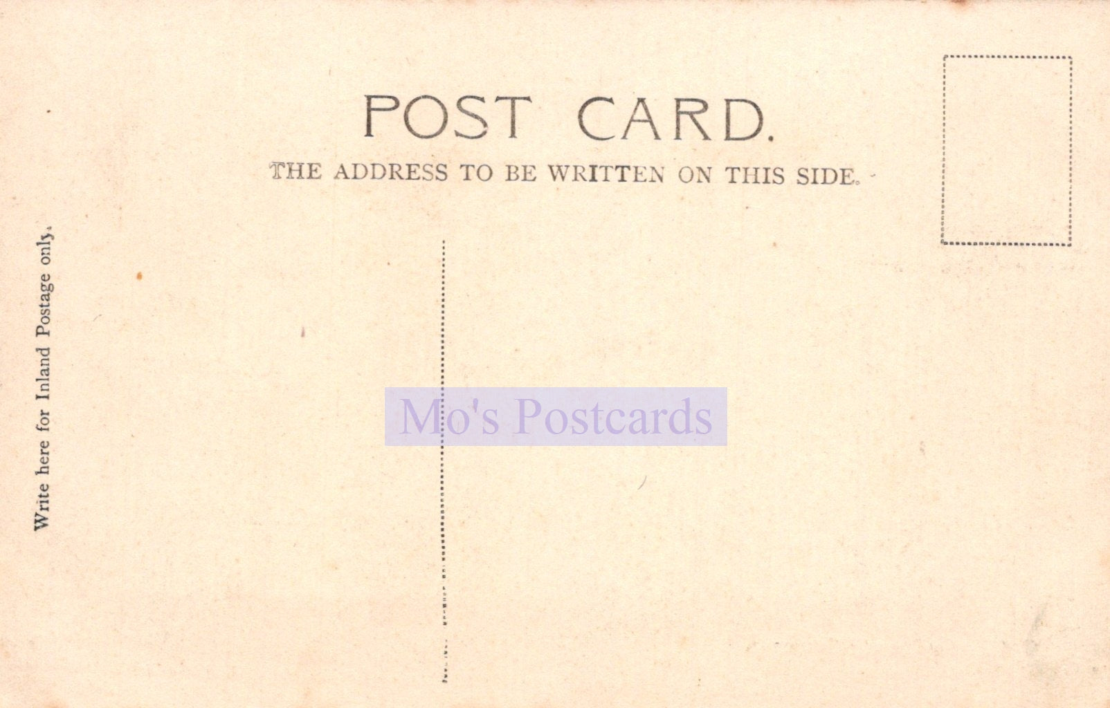 Back of a vintage postcard with text and a stamp area.