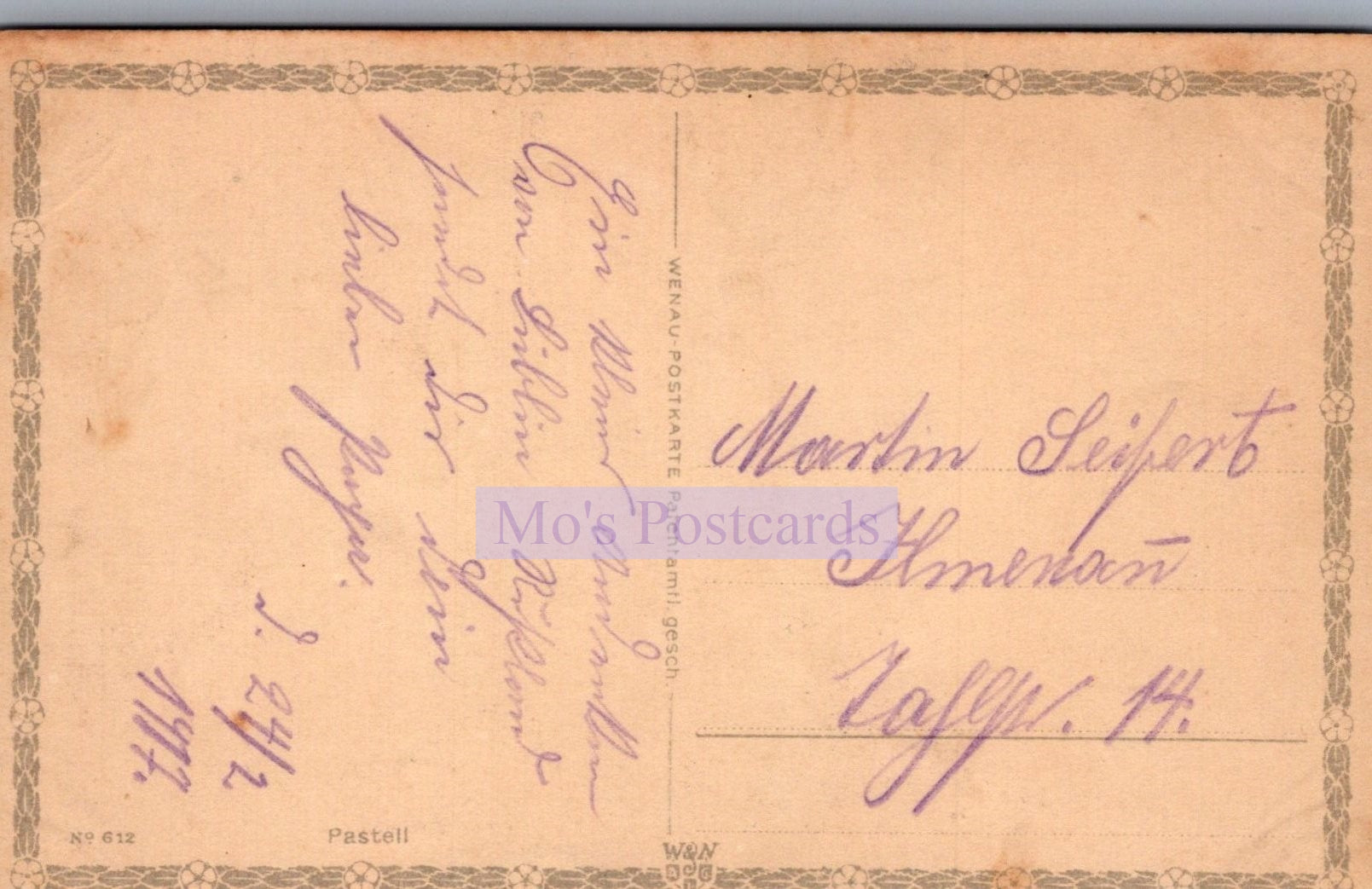 Vintage postcard with handwritten text on a beige background