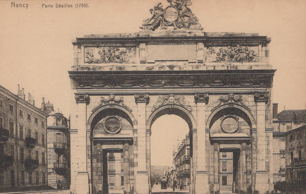 Vintage photograph of a stone archway with decorative elements, likely a historical monument, in a city setting.