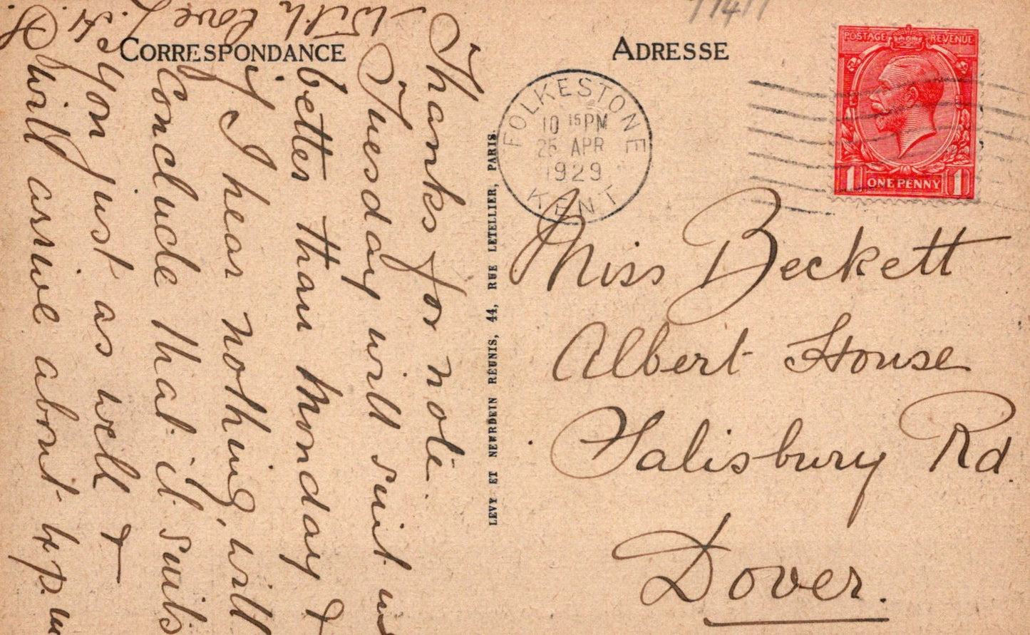Vintage postcard with text and a red stamp, featuring a historical design.