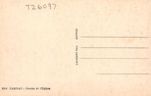 Load image into Gallery viewer, Back of a postcard with text and a grid for writing, on a beige background.
