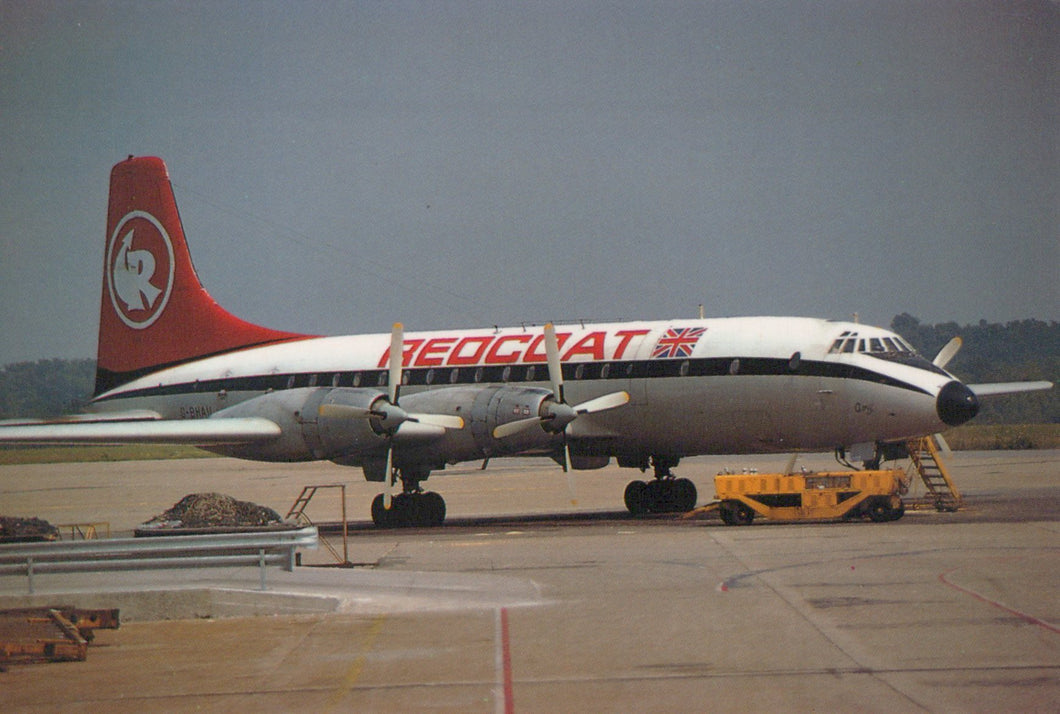 Vintage aircraft with 'Redcruit' branding on a tarmac