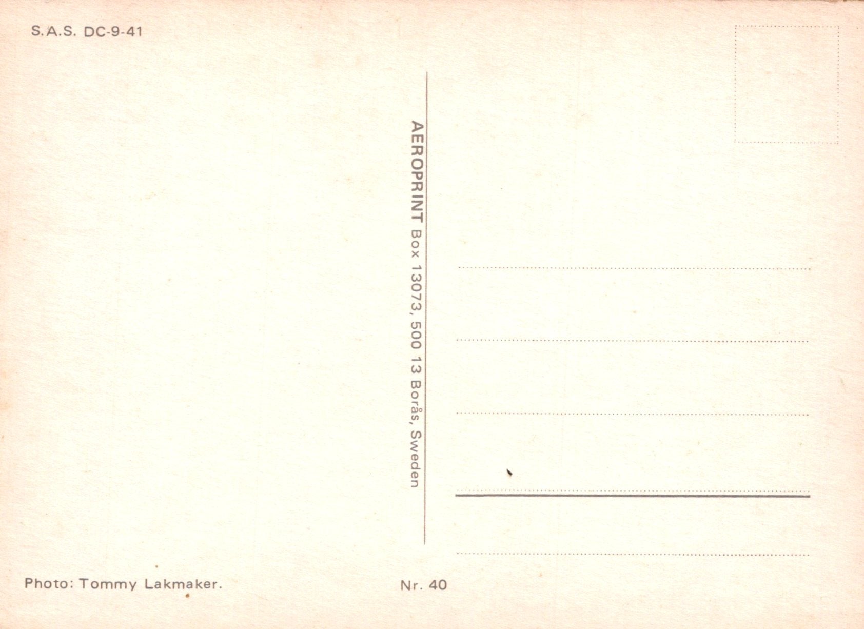 Vintage postcard with text and a photo credit on a light pink background
