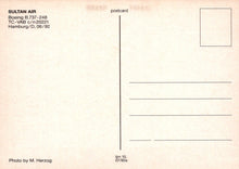 Load image into Gallery viewer, Back of a postcard from Sultan Air with airplane details and a photo credit.
