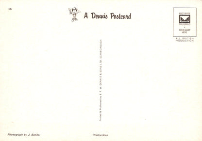 Back of a Dennis the Menace postcard with branding and text.