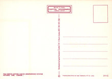Load image into Gallery viewer, Back of a postcard with text and a red border, featuring &#39;Capital Souvenirs&#39; branding.
