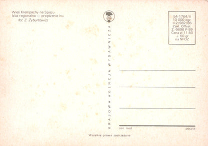 Back of a postcard with text and a logo on a light background
