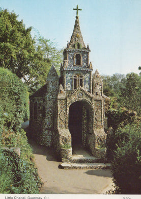 Small chapel with decorative tile work in a garden setting