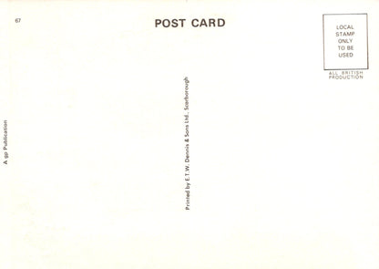 Back of a postcard with text and a stamp area.