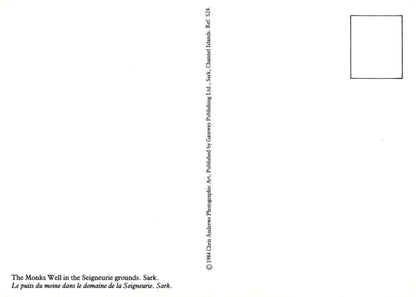 Back of a postcard with text and a small square image placeholder