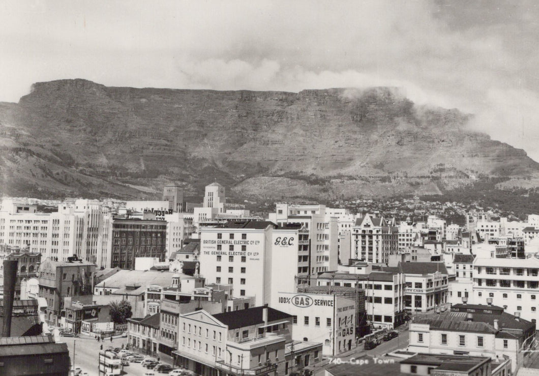 Vintage black and white photo of a cityscape with Table Mountain in the background