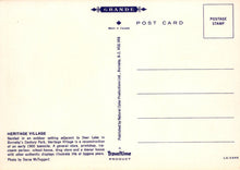 Load image into Gallery viewer, Back of a postcard from Heritage Village with text and branding details.
