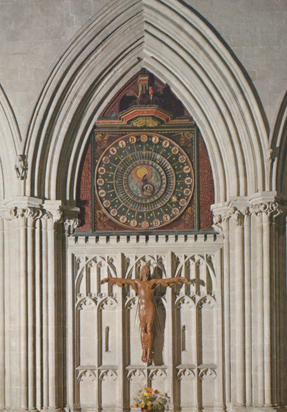 Mosaic clock and crucifixion scene in a cathedral setting