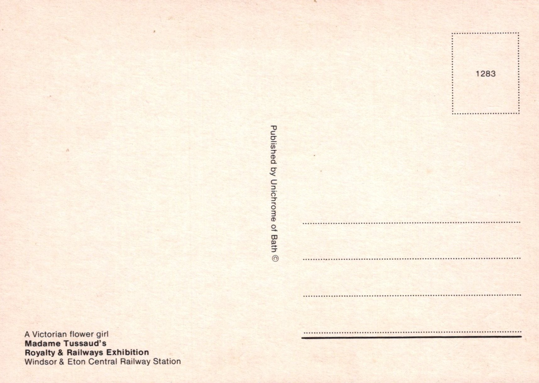 Back of a postcard with text and a small square with number 1283 on a beige background