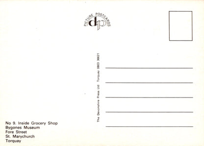 Back of a postcard with text and a logo, featuring a white background.