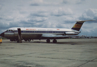 Passenger airplane on a runway with 'Merpati' branding against a cloudy sky.