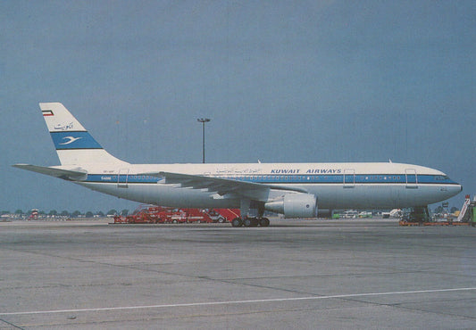 Kuwait Airways airplane on a runway with clear sky