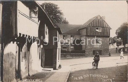 Sussex Postcard: Steyning "In An Old Fashioned Town" Boy on Bicycle BH2820