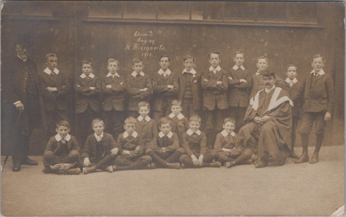 Education Postcard - Teacher & Pupils, Class D. Aug: 29. St Margaret's 1908-XT4463