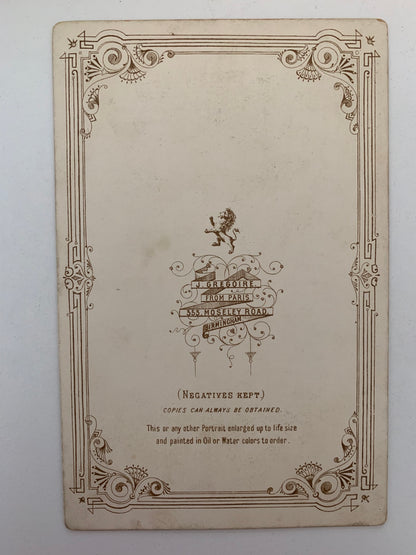 Vintage-style card with decorative border and text on a white background