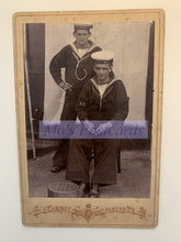 Load image into Gallery viewer, Vintage photo of two men in sailor outfits with a &#39;Cabinet Portrait&#39; label.
