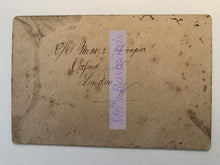 Load image into Gallery viewer, Vintage brown paper card with handwritten text and a label on a white background
