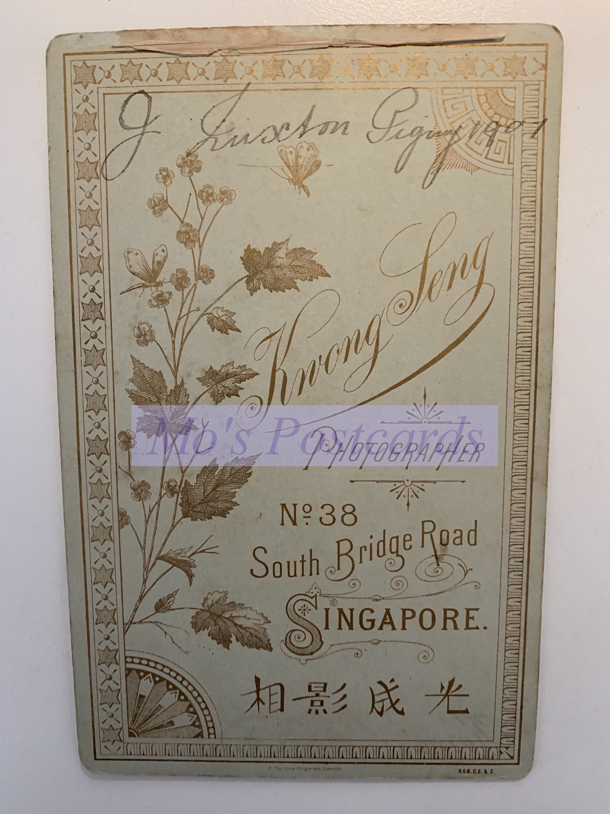 Vintage-style card with decorative text and floral elements on a white background