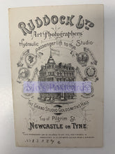Load image into Gallery viewer, Vintage advertisement for Ruddock &amp; Co. Art Photographers with a building illustration on a white background.
