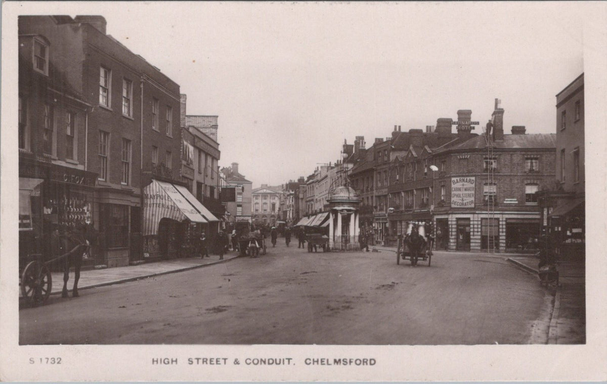 Essex Postcard: Chelmsford High Street Conduit Shopfronts Maypole RPPC  BT298