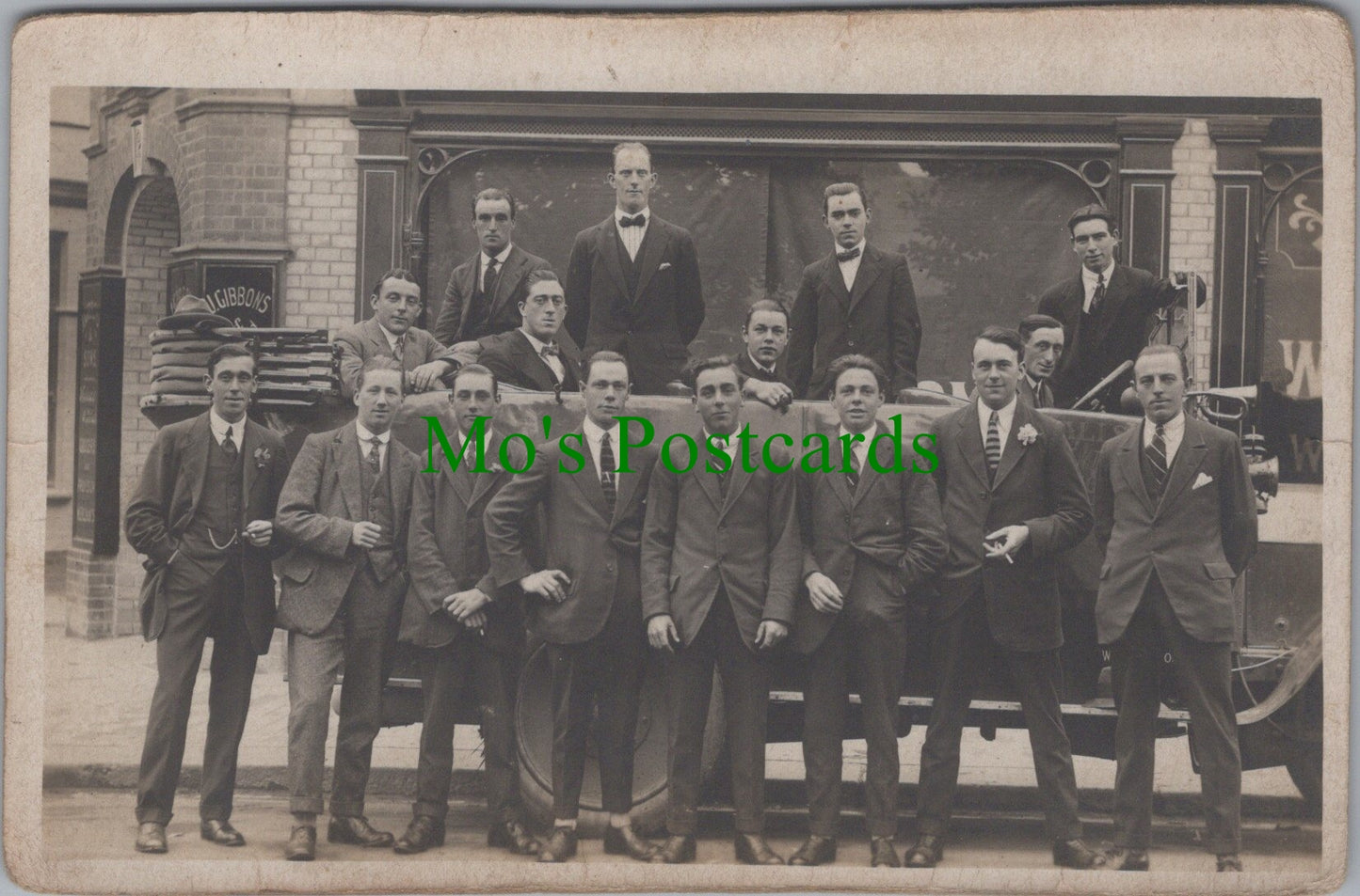 Unknown Location Postcard - Group of Men Outside J.Gibbons & Sons Premises Ref.SW9901