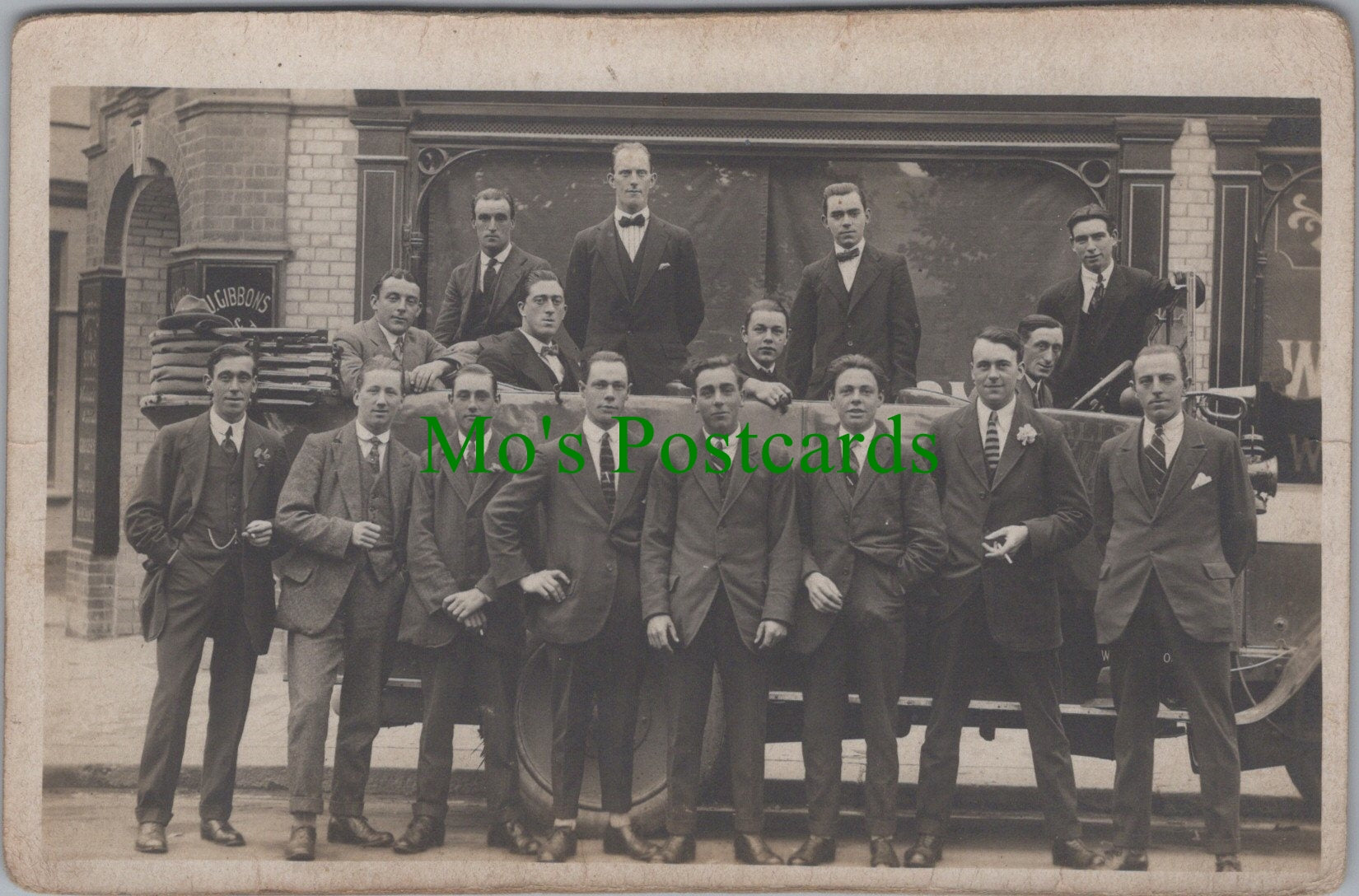 Unknown Location Postcard - Group of Men Outside J.Gibbons & Sons Premises Ref.SW9901
